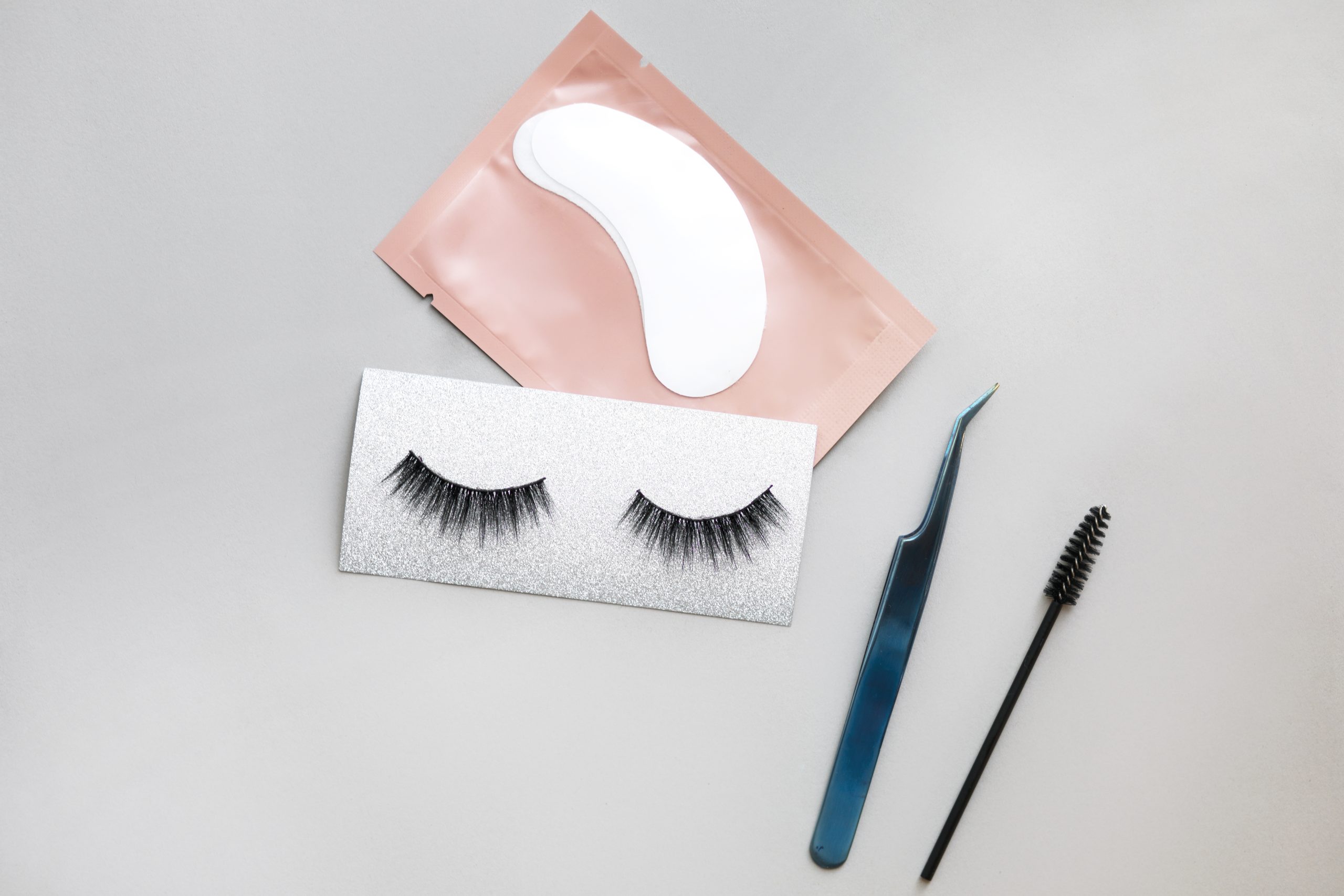 top-view-eyelashes-tools-arrangement